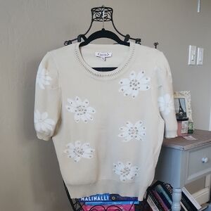 Nanette Lepore Cream Sweater with White Floral Embellishments